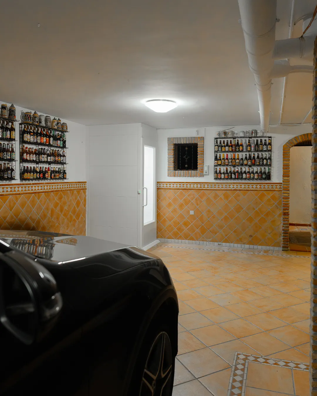 Ascensor Aritco HomeLift Compact de cristal y paneles en blanco · Vivienda unifamiliar con patio en Córdoba · vista general